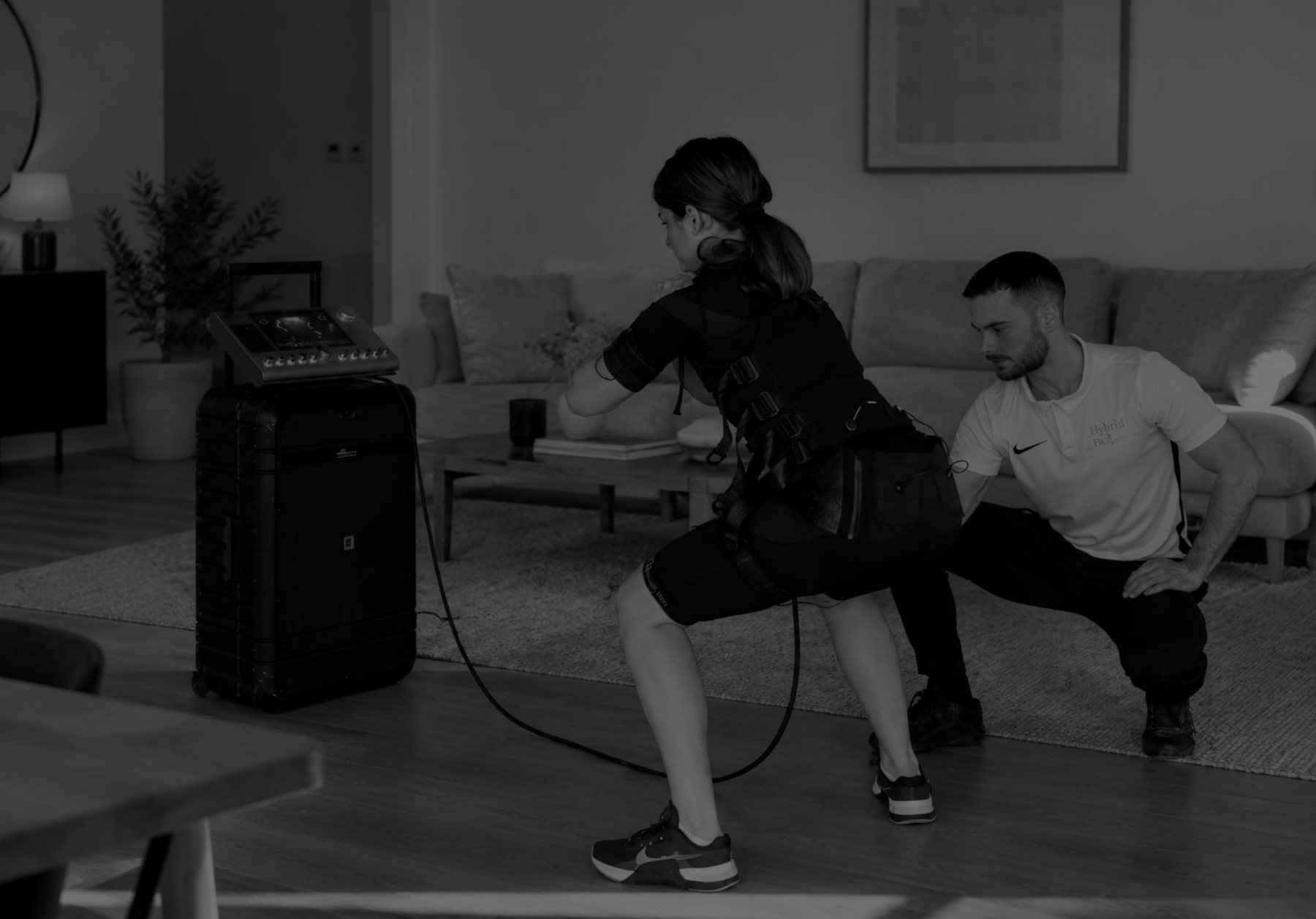 Séance d'électrostimulation EMS à domicile avec le coach Hybrid Fit